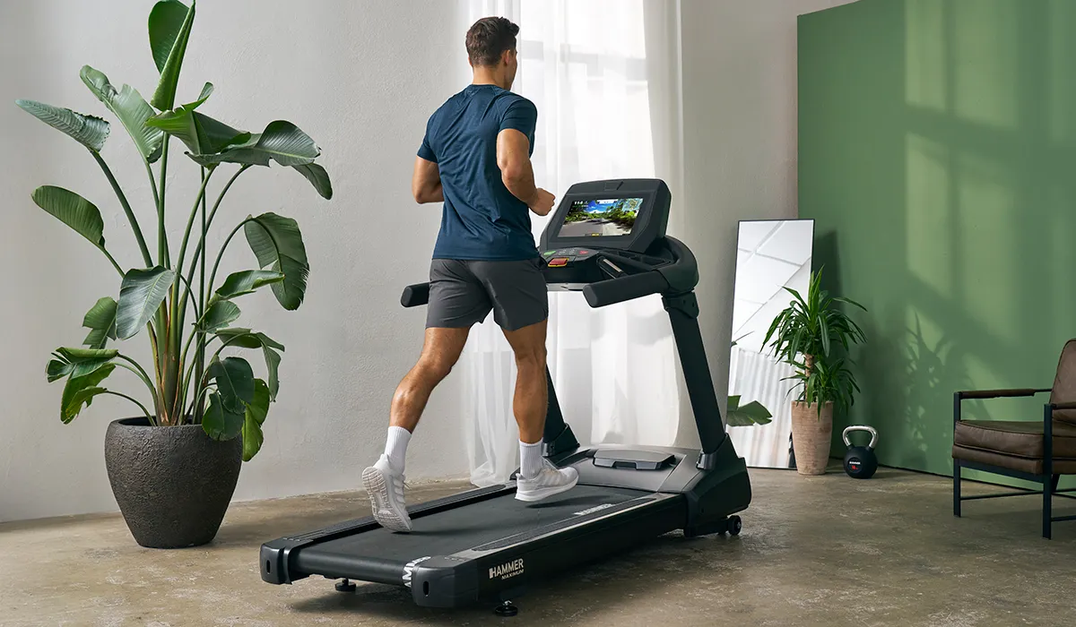 Hammer-commercial-treadmill-with-a-man-running-on-it Close Up 4